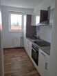 Sanierte Wohnung mit verglastem Balkon - Küche mit Einrichtungsvorschlag