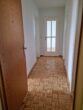 Sanierte Wohnung mit verglastem Balkon - Flur - Beispielfoto